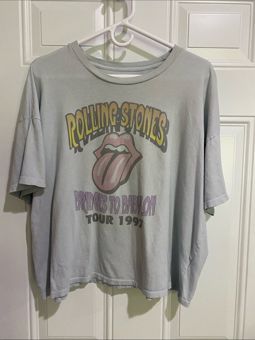 the Rolling Stones Pale blue Crop Tee with Multicolor Tongue Graphic